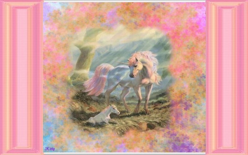 Unicorn and foal in a dreamy landscape