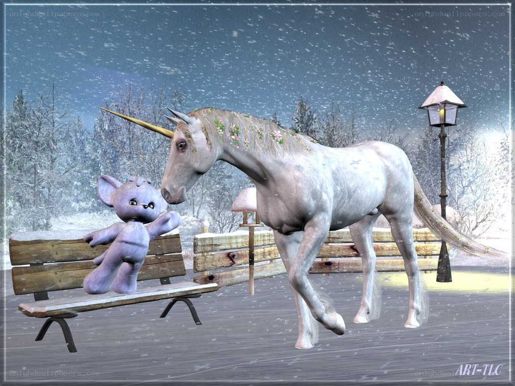 Unicorn and toy in snow