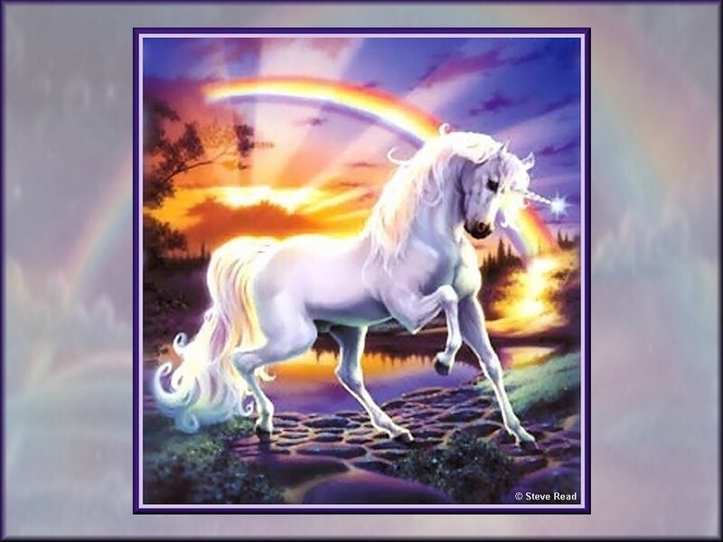 Unicorn at sunset with rainbow