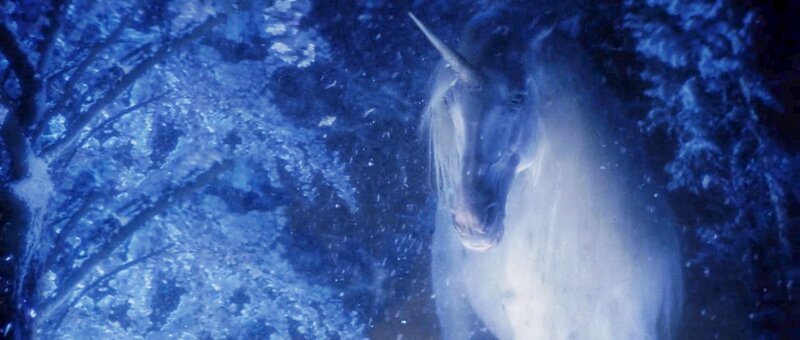 Unicorn in Snowy Forest — Blue