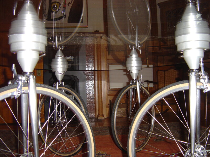 Unicycles in a display case