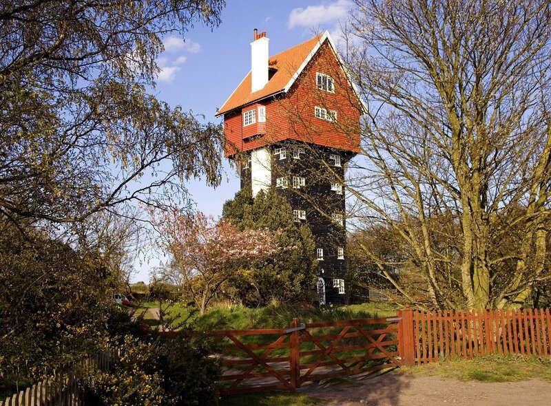 Unique red and black tower house