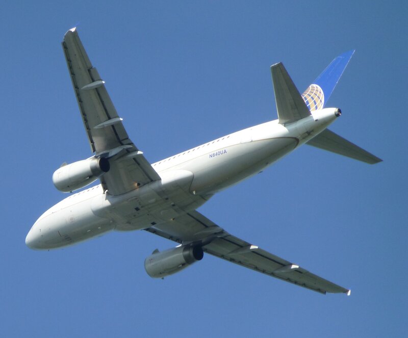 United Airlines Airplane — Blue, Clear, Afternoon