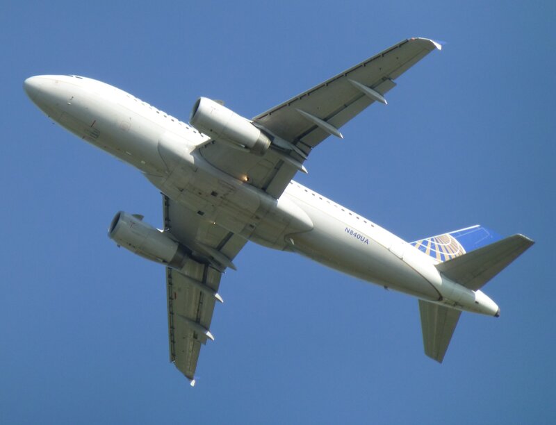 United Airlines Airplane — Blue, Clear