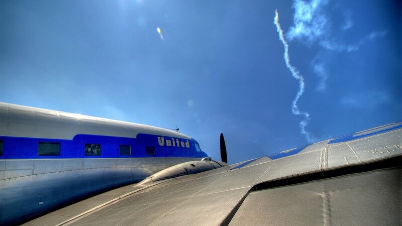United Airlines Plane — Blue, Dramatic, Afternoon