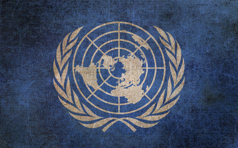 United Nations emblem on blue background