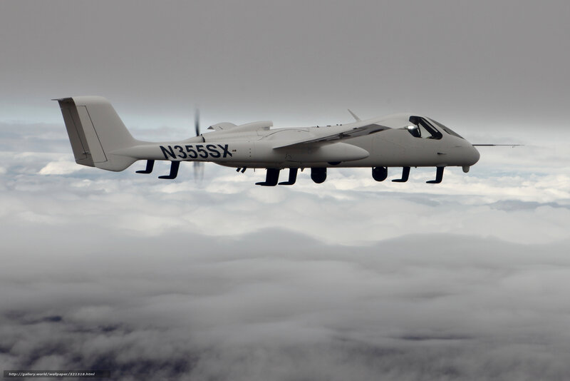 Unmanned aircraft flying above clouds