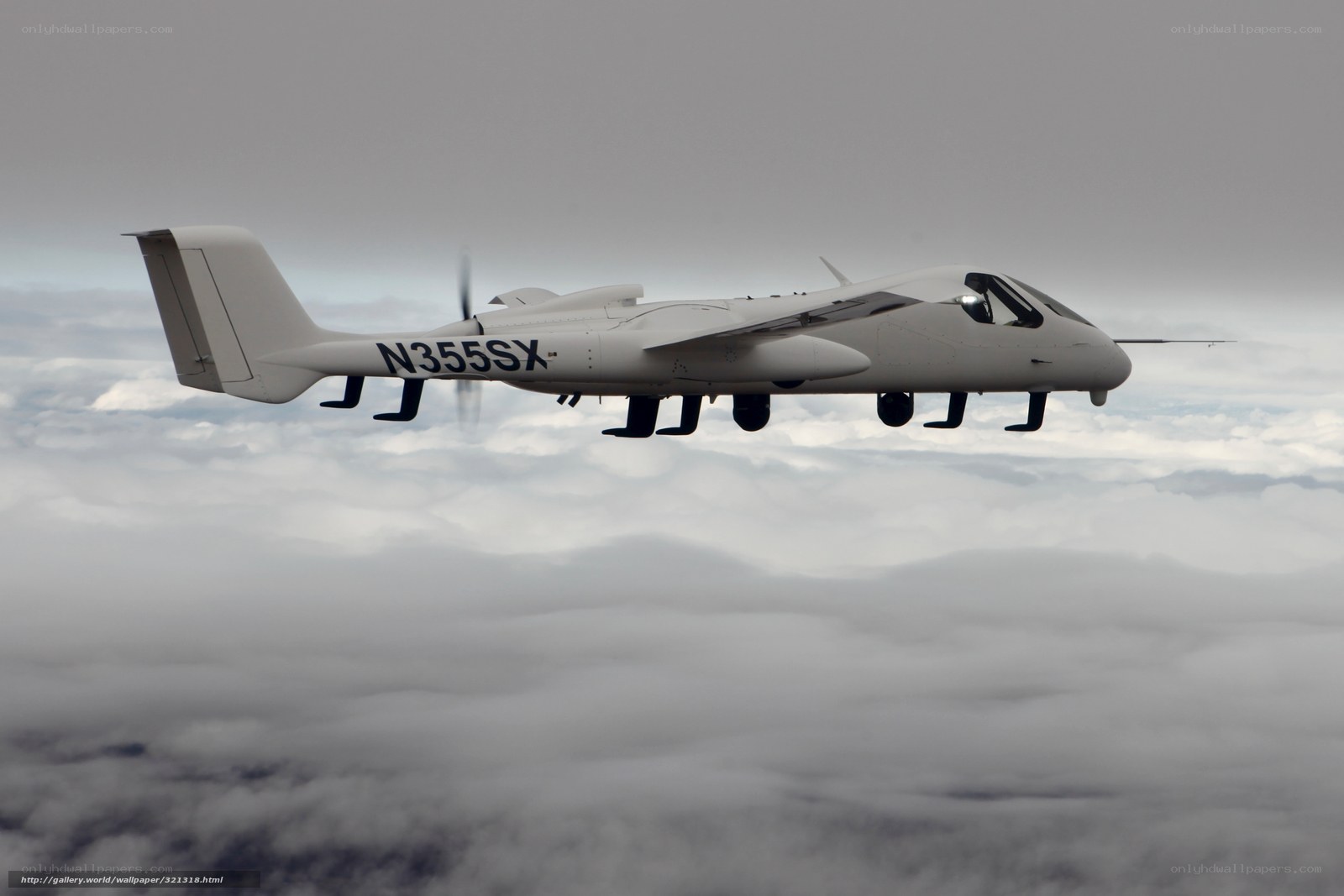 Unmanned aircraft flying above clouds