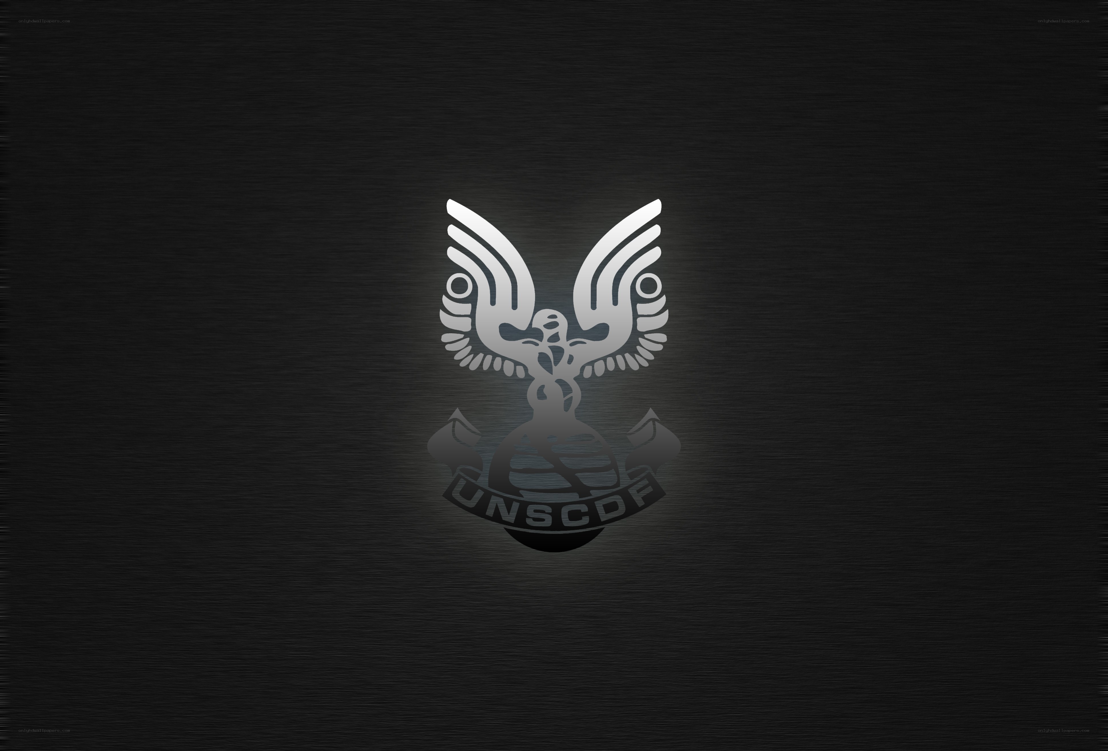 UNSCDF emblem on dark background