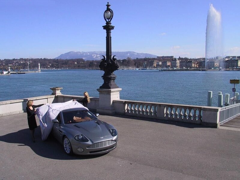 Unveiling a luxury car by the lake