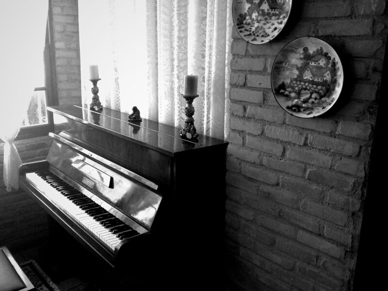 Upright Piano in Room