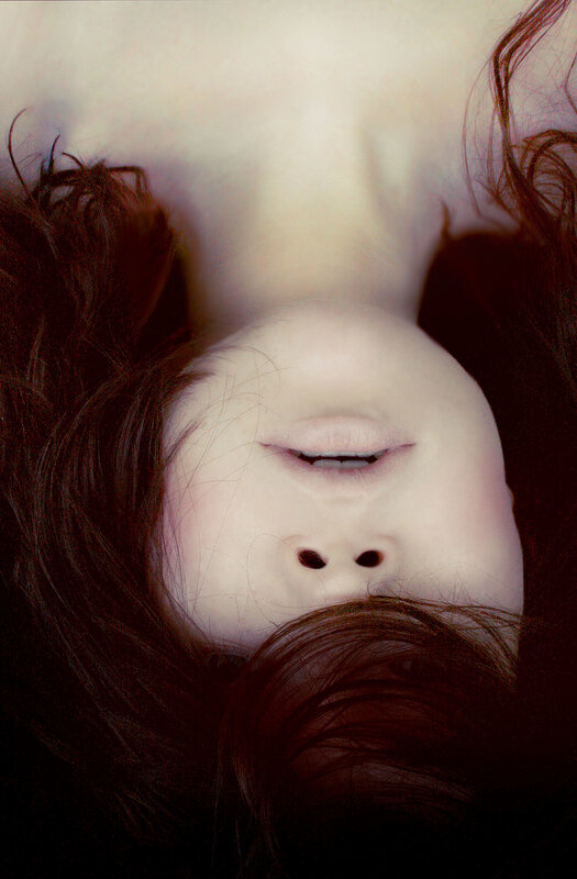 upside-down face with closed eyes