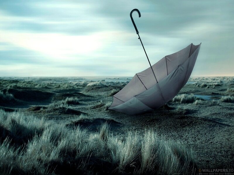 Upturned Umbrella on Dunes