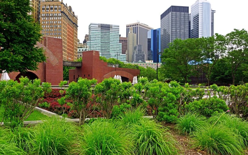 Urban park with city skyline