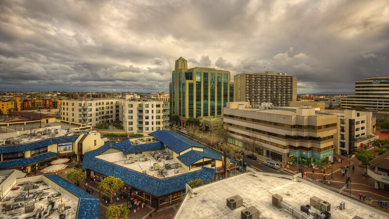 Urban skyline with blue-roofed buildings