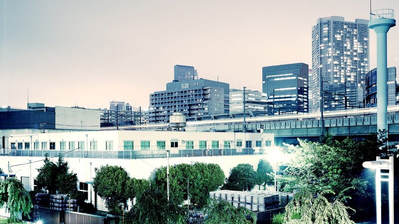 Urban skyline with train and buildings
