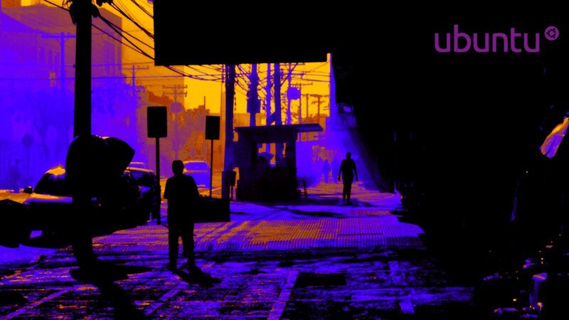 Urban street at night with Ubuntu logo