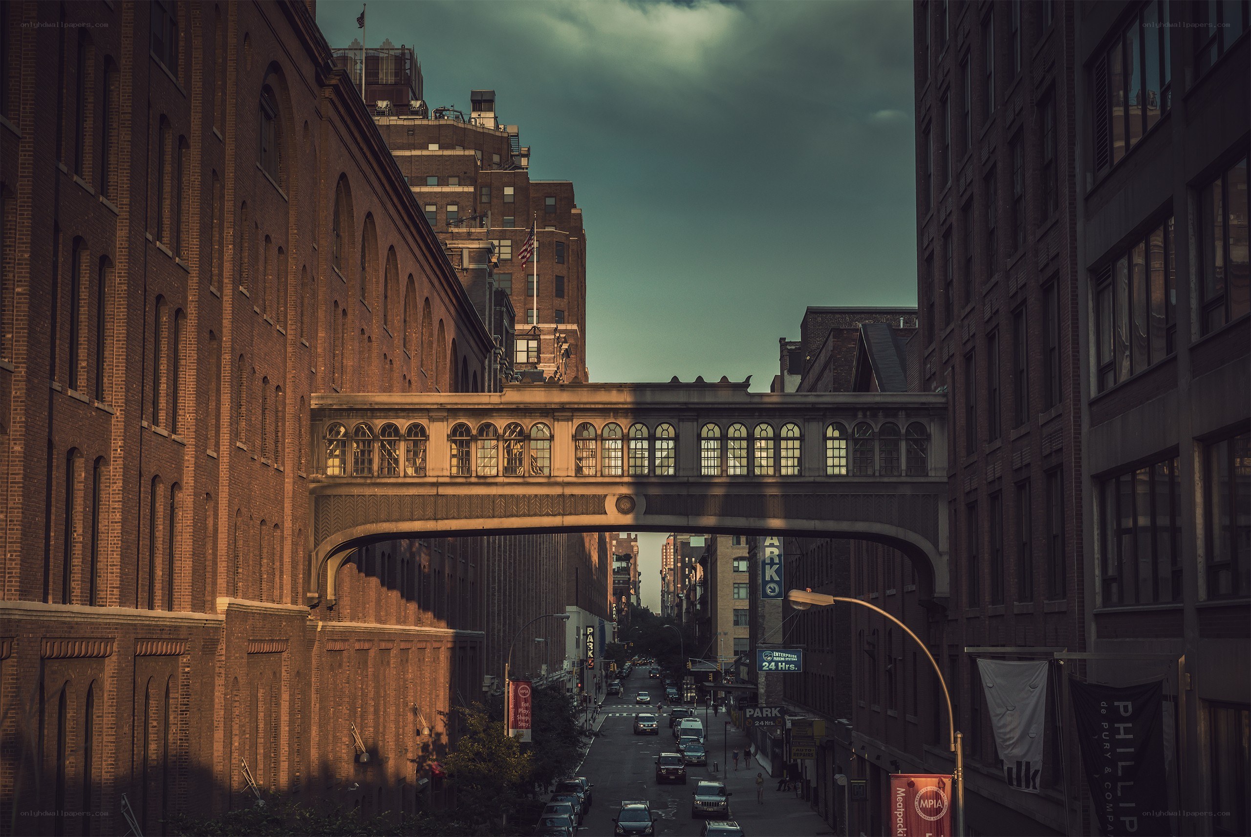 Urban street with pedestrian bridge