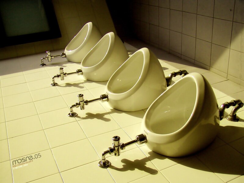 Urinals in a public restroom