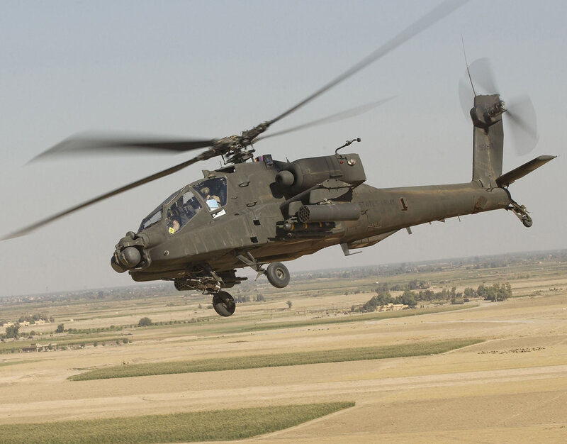 US Army Apache helicopter in flight