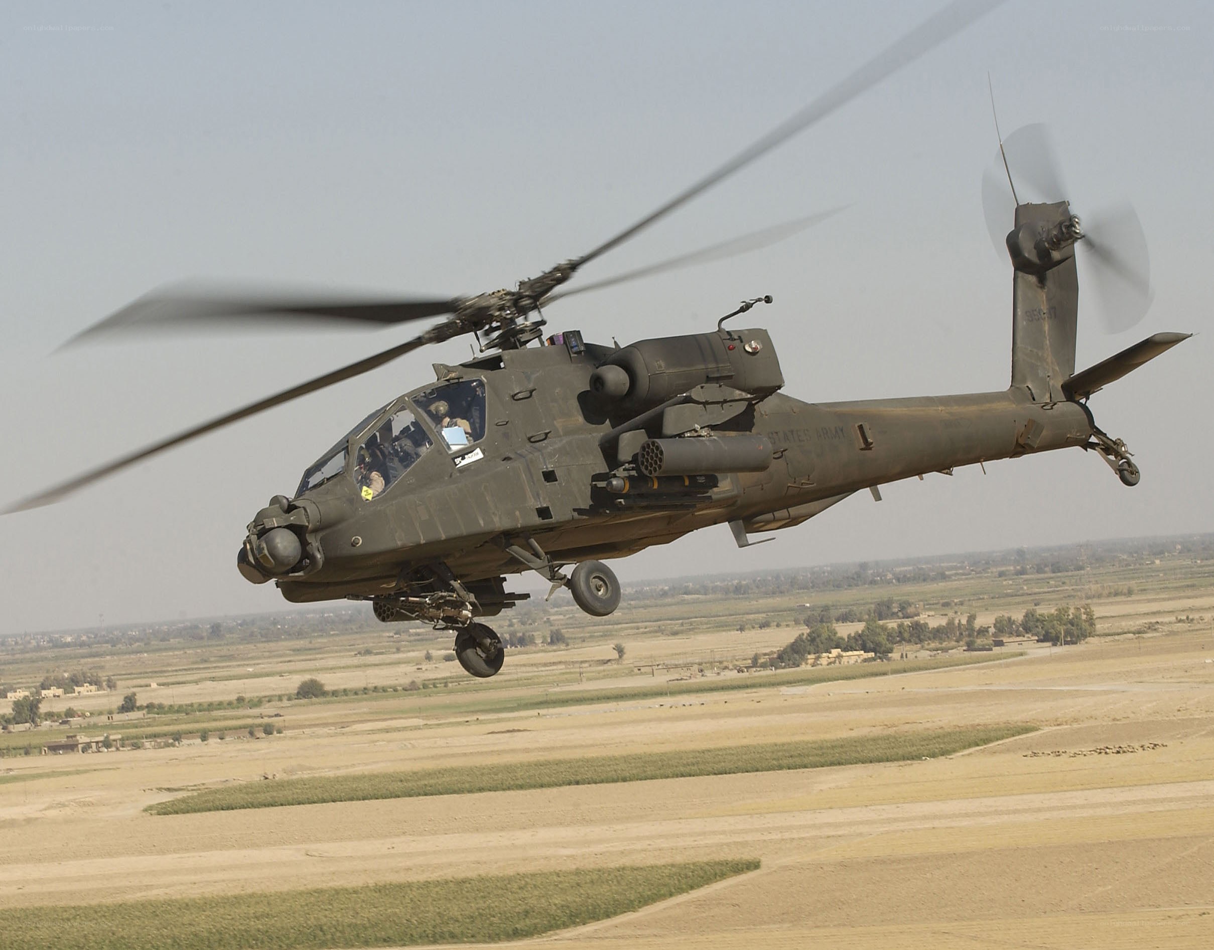 US Army Apache helicopter in flight