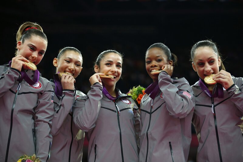 USA gymnastics team with gold medals
