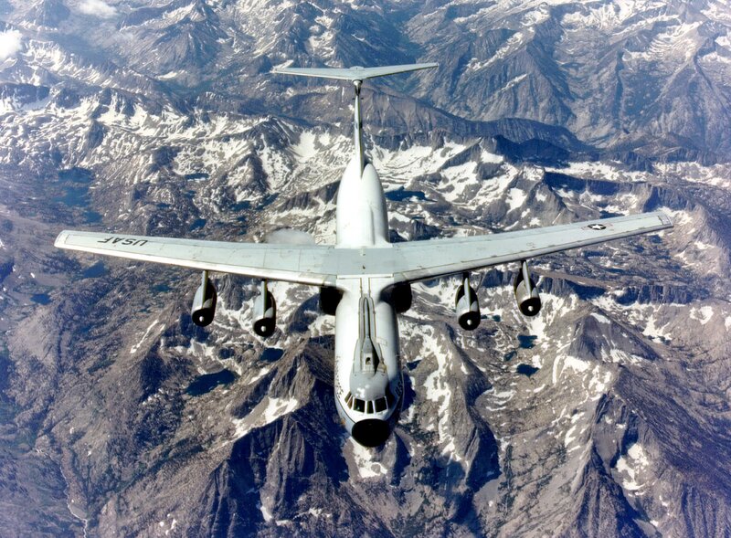 USAF aircraft over snowy mountains