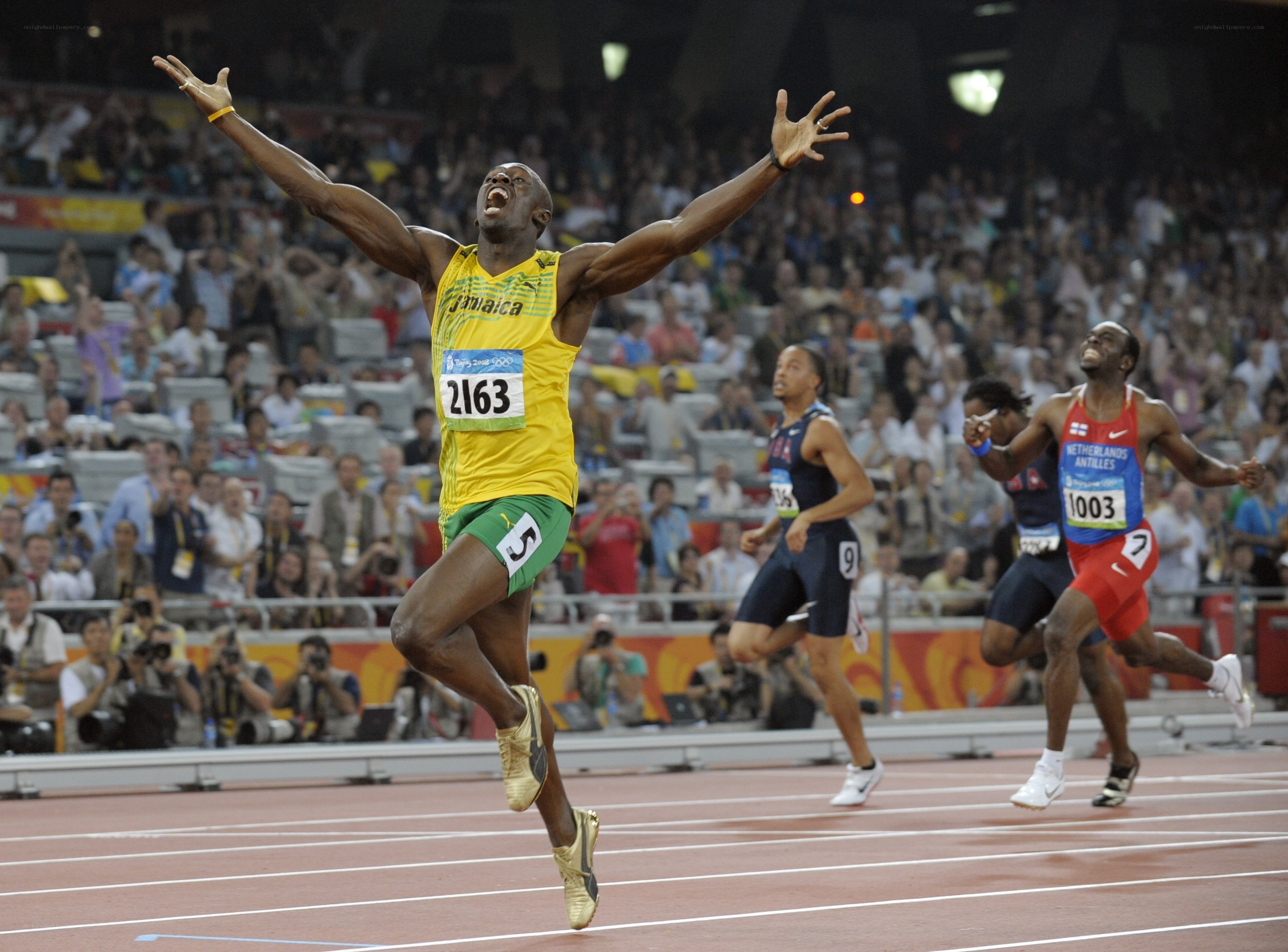 Usain Bolt celebrates victory