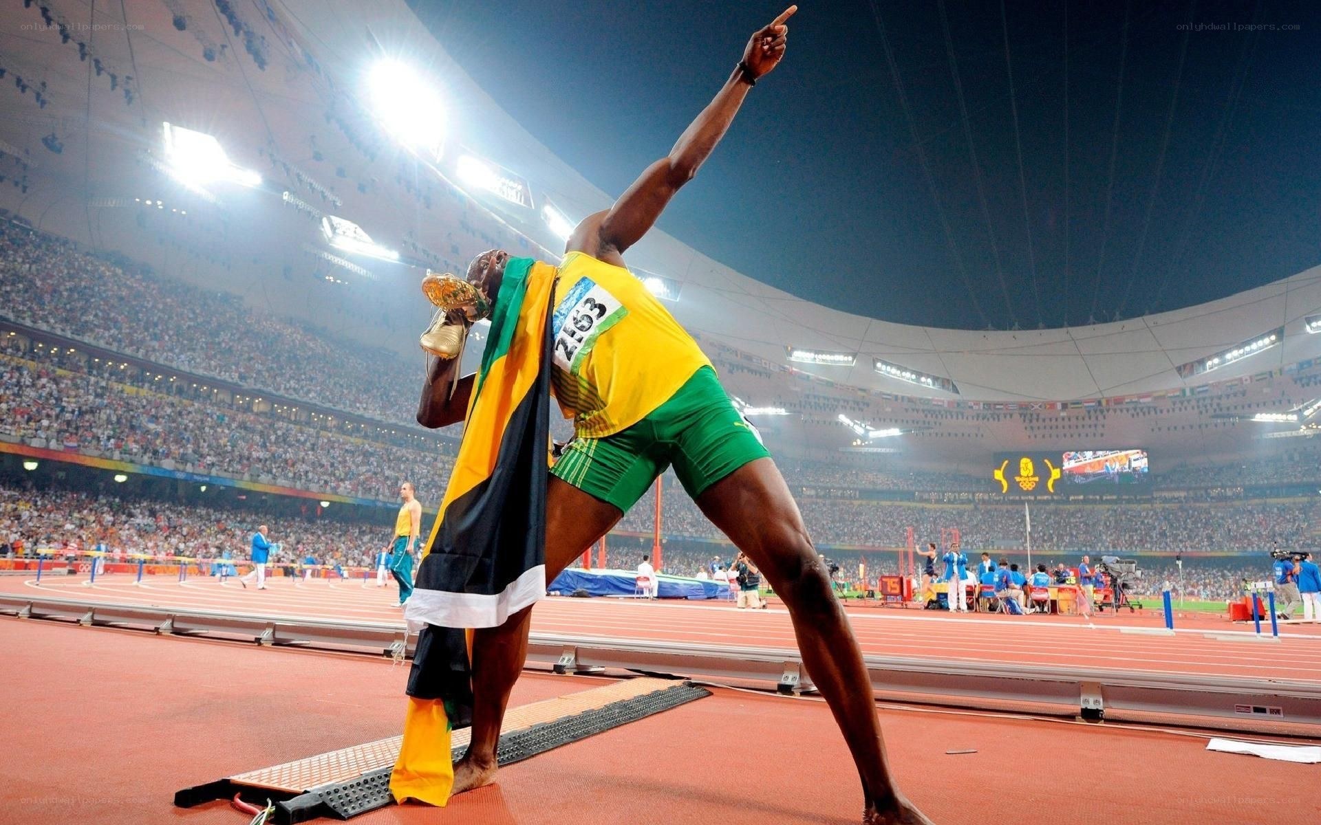 Usain Bolt celebrates victory