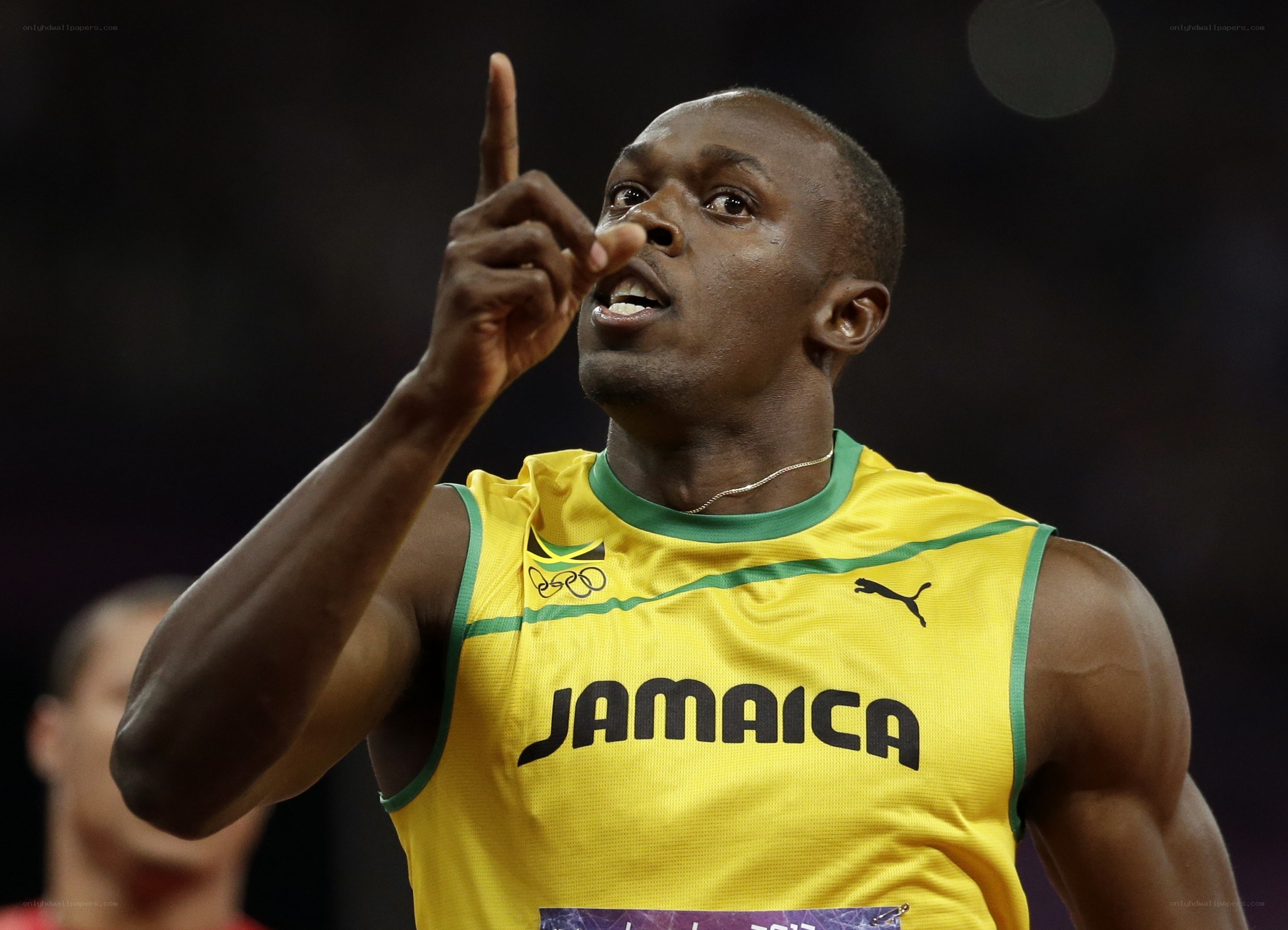 Usain Bolt celebrates victory