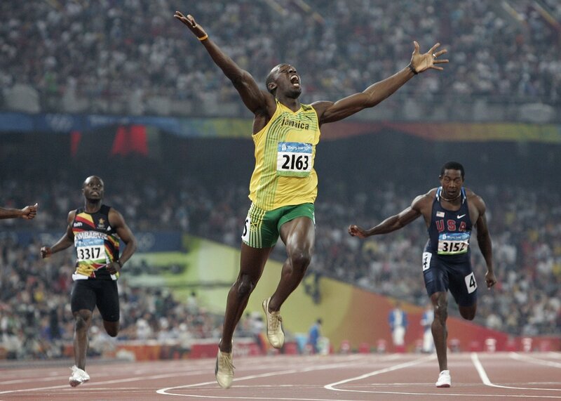 Usain Bolt celebrates victory