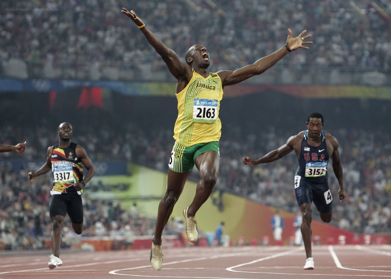 Usain Bolt celebrates victory