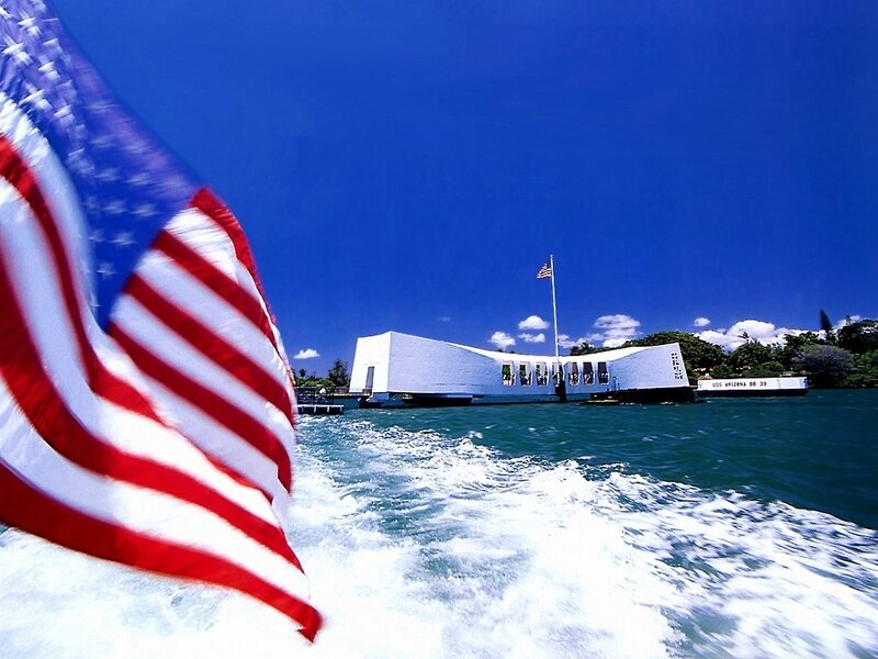 USS Arizona Memorial and American flag