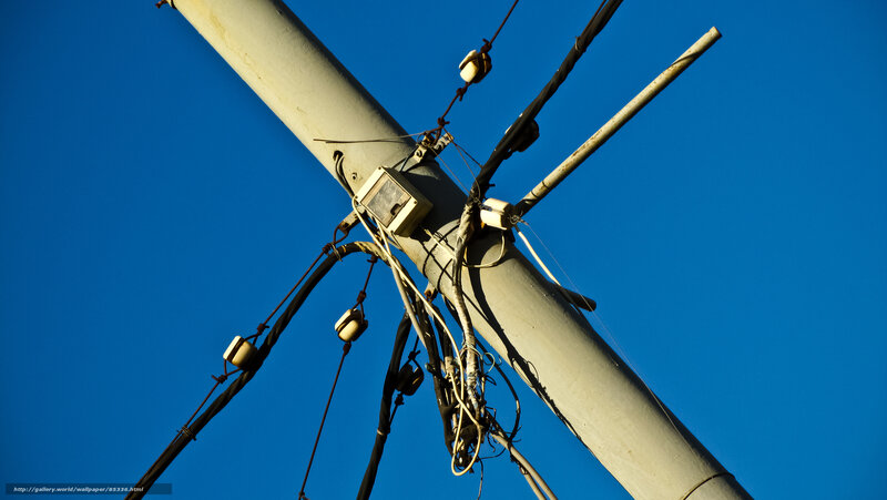 Utility pole against blue sky