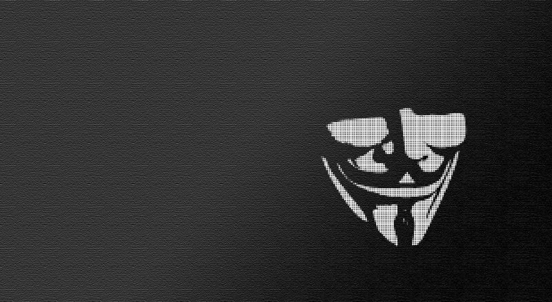 V for Vendetta mask on dark background