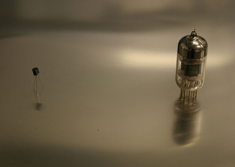 Vacuum tube and transistor on metal surface