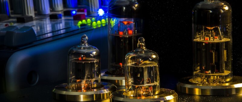 Vacuum Tubes on Amplifier — Black, Dramatic