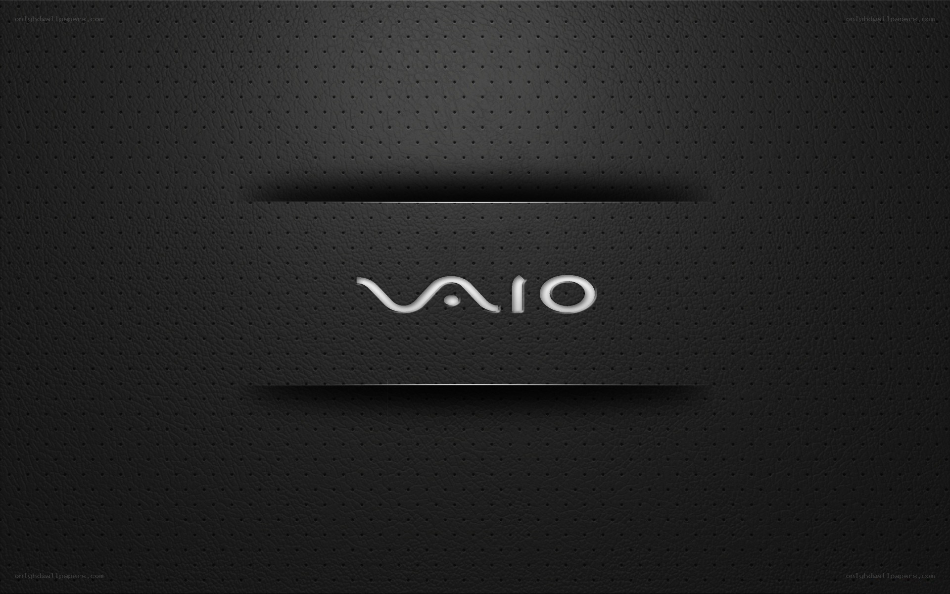VAIO logo on textured black background