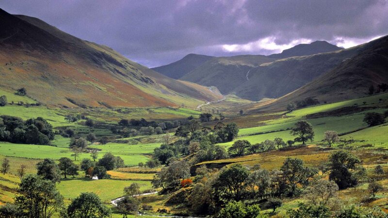 valley with green hills and mountains