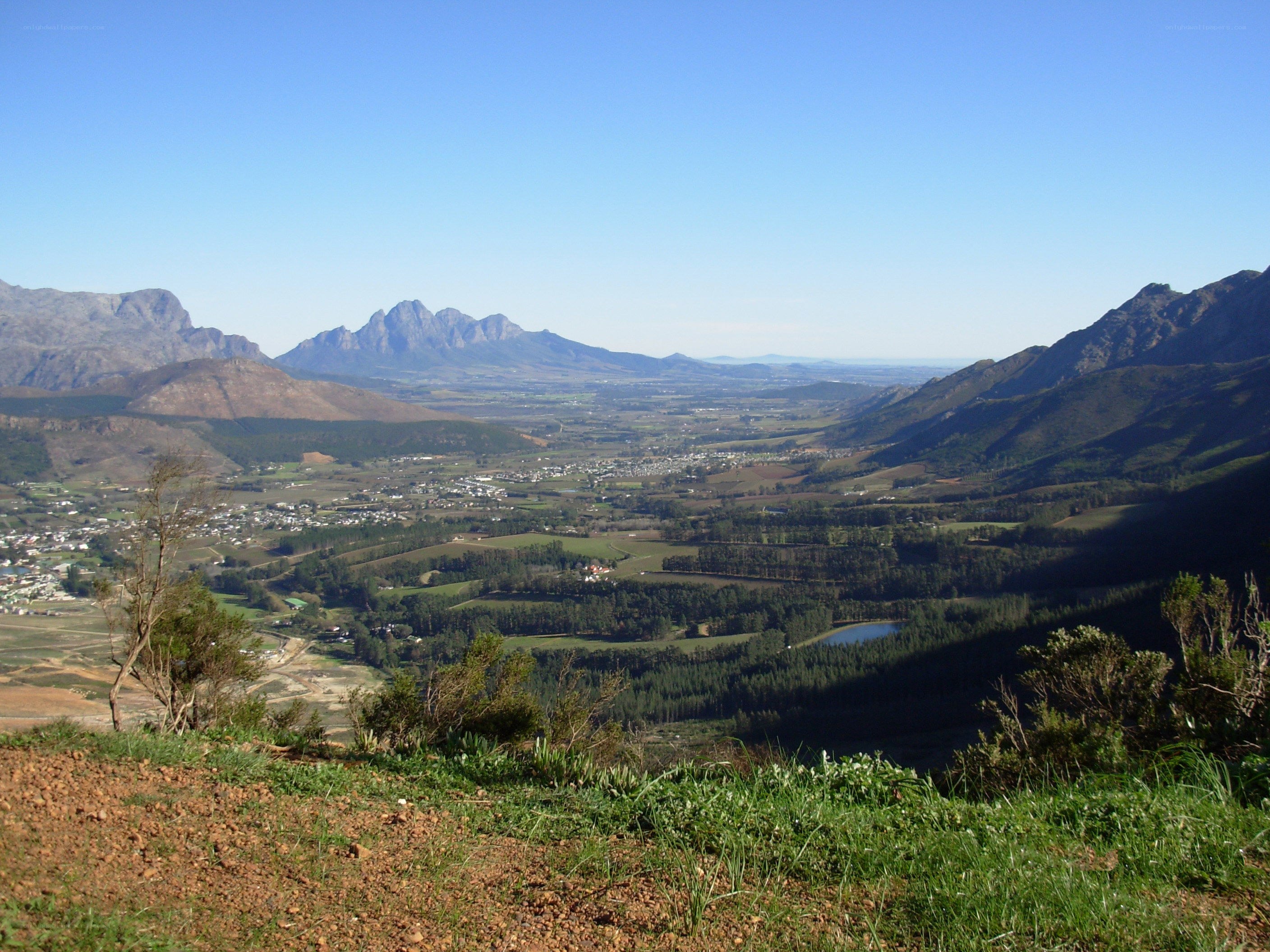 valley with mountains and town