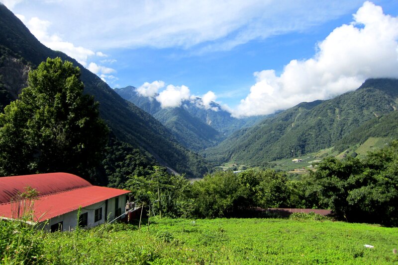 Valley with Red-roofed Building