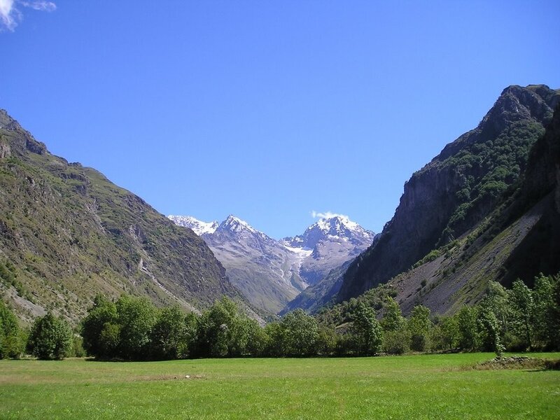 valley with snow-capped mountains
