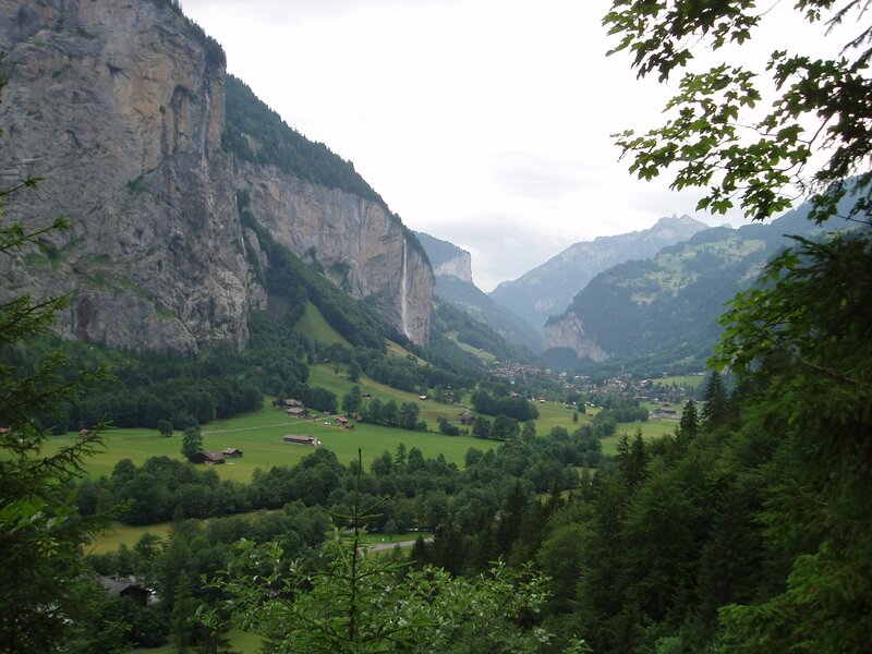 valley with waterfall and mountains
