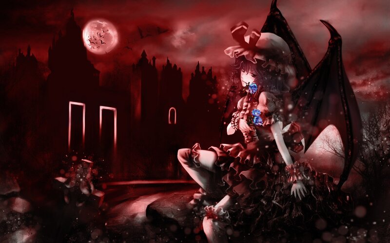 Vampire girl in a gothic landscape