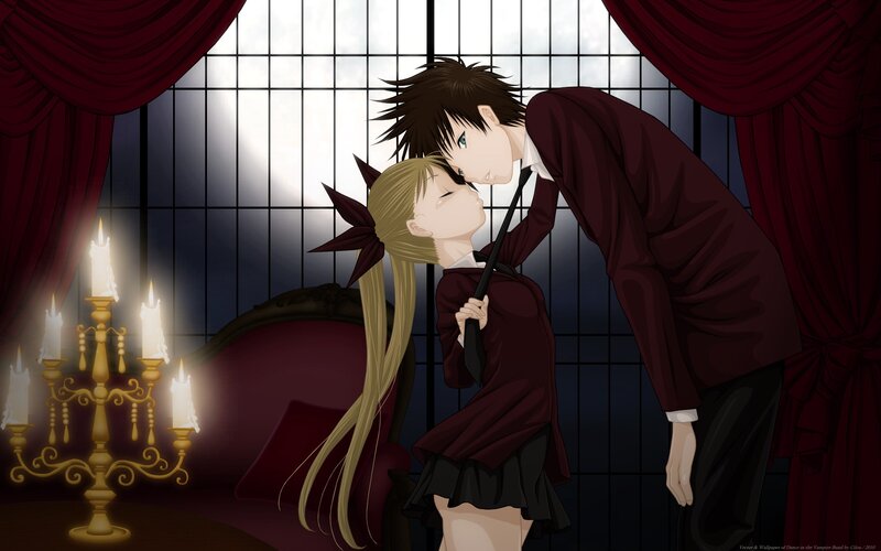Vampire kiss in a candlelit room