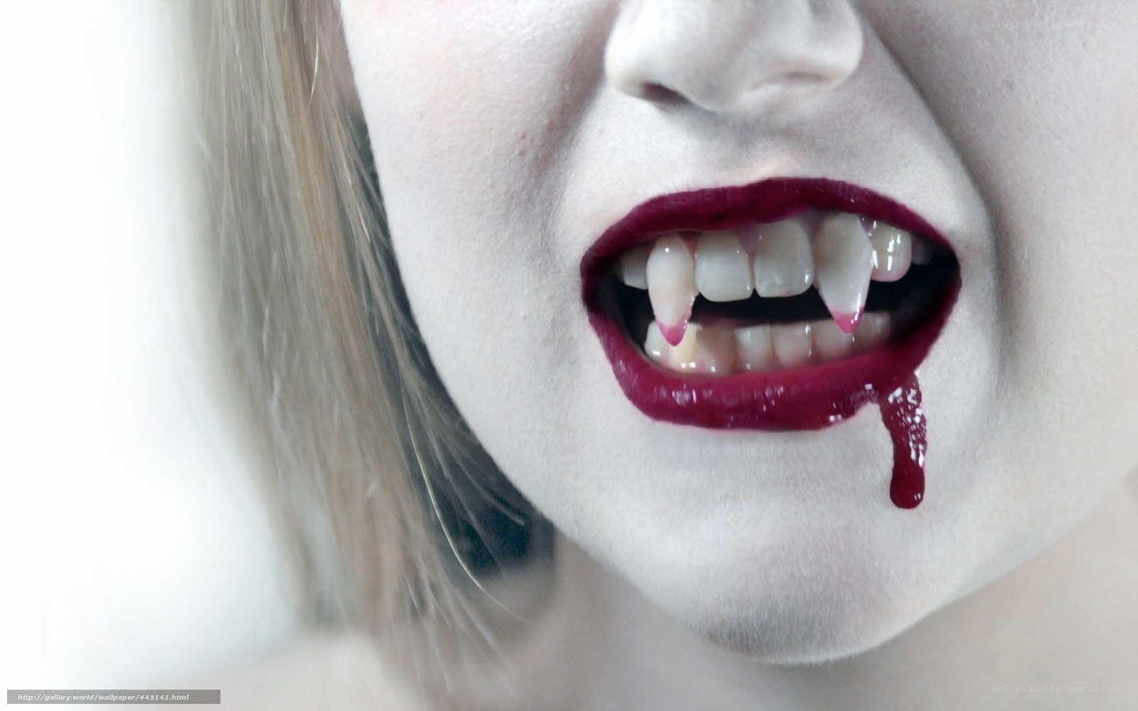 vampire with fangs and blood