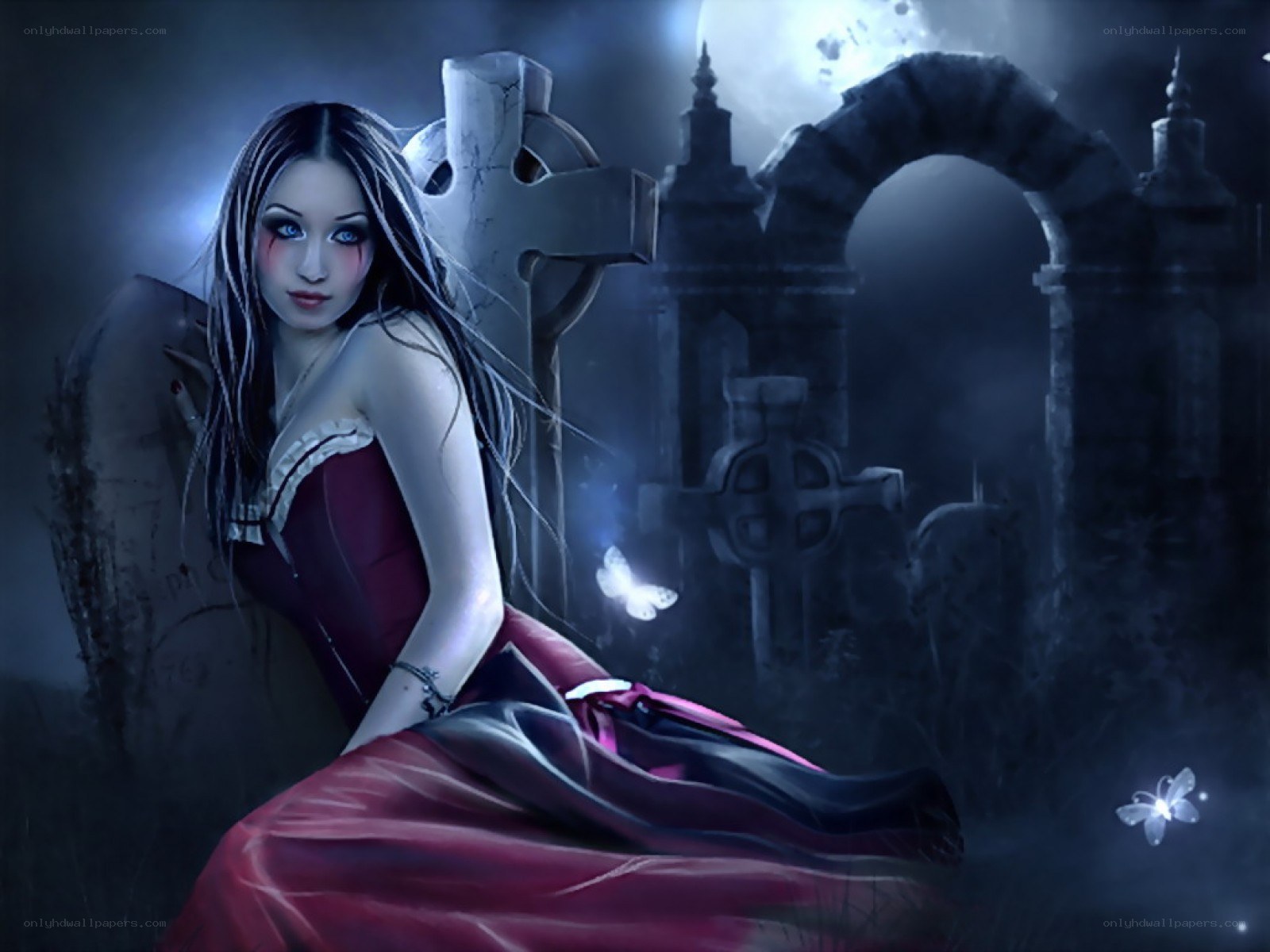 Vampire woman in a graveyard