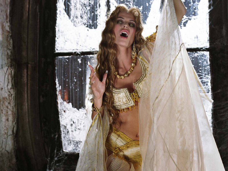 vampire woman in golden costume