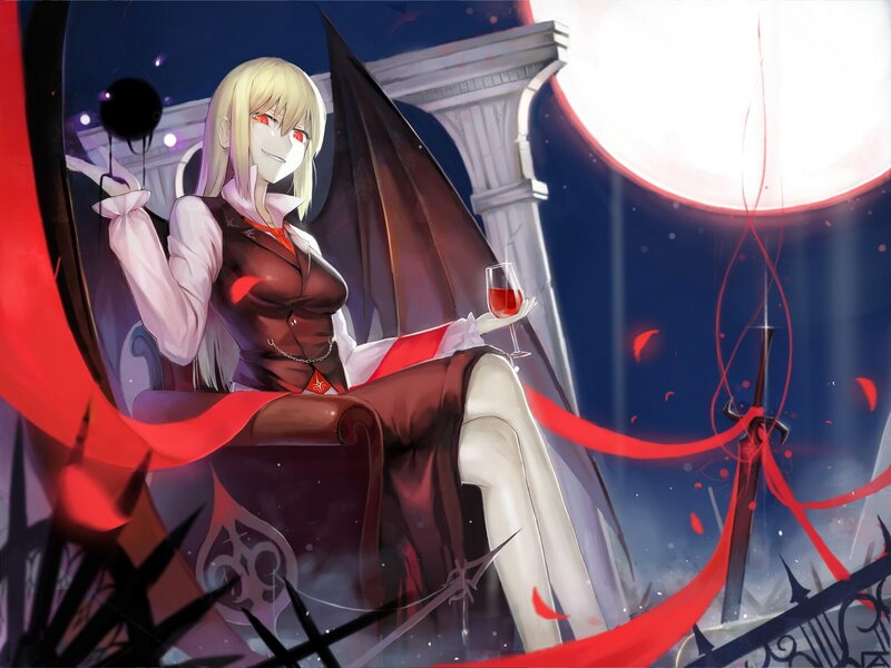 Vampire woman with wine glass