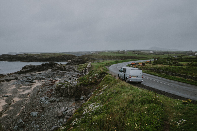 Van on coastal road